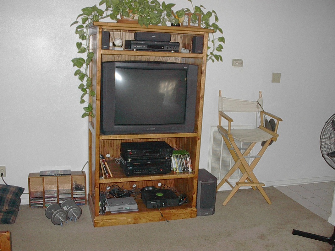 Custom Television Cabinet Made from Shipping Pallets and Old Playsets