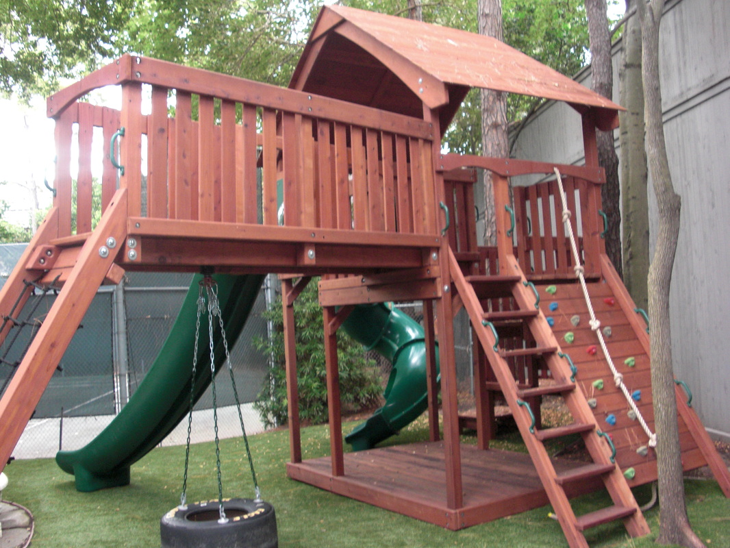 Redwood Fort with Bridge, Cargo Rope Climb, Rock Wall, Tire Swing, 14' Slide and Spiral Slide
